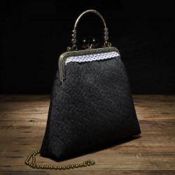 Bolso con cierre de boquilla y asa Vintage